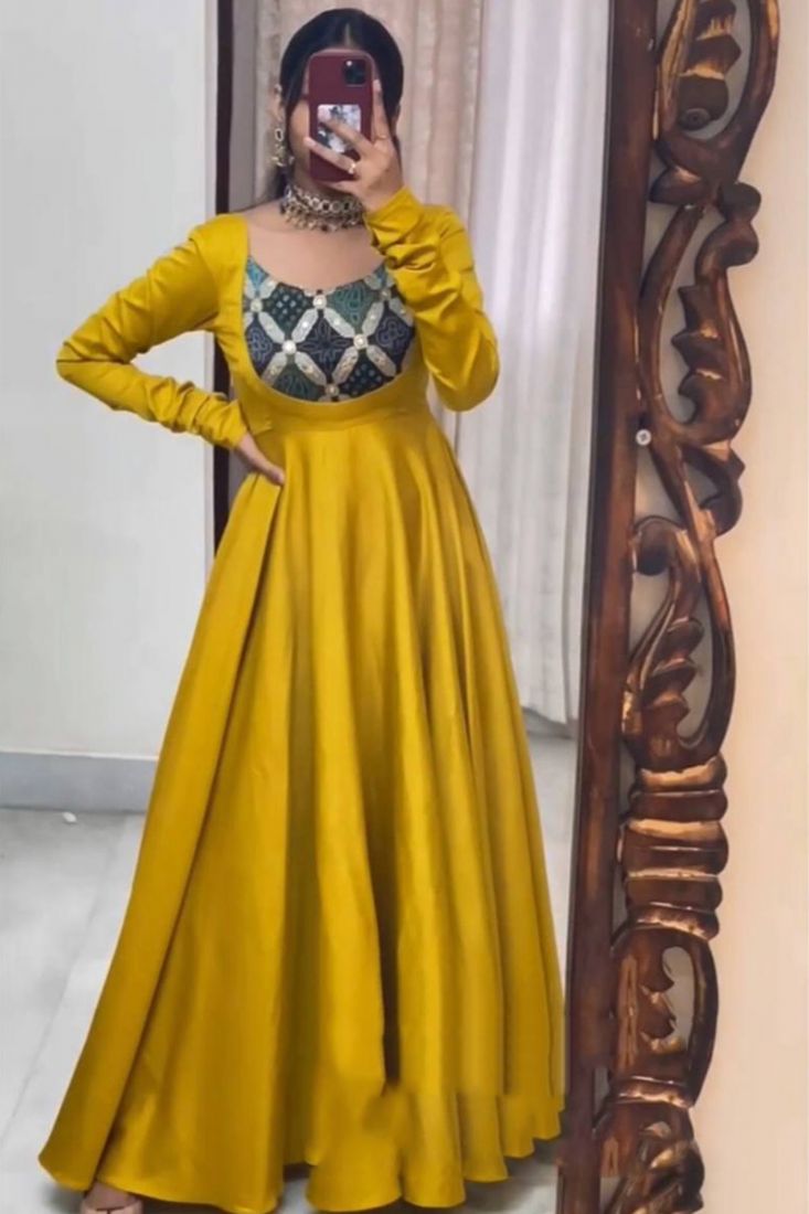 Yellow Color Satin Fabric Partywear Gown With Mirror Work